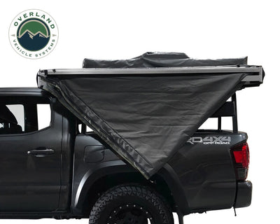 Overland Vehicle Systems Nomadic Awning 270 Dark Gray Cover With Black Transit Cover Driver Side & Brackets